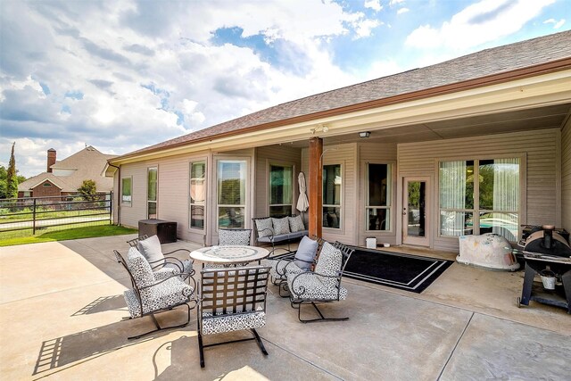 view of patio with an outdoor fire pit