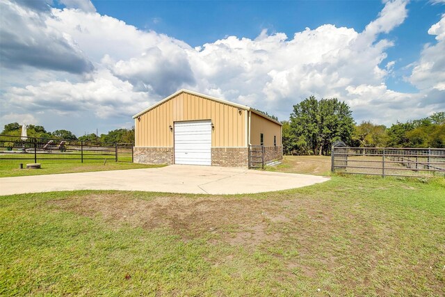 garage with a yard