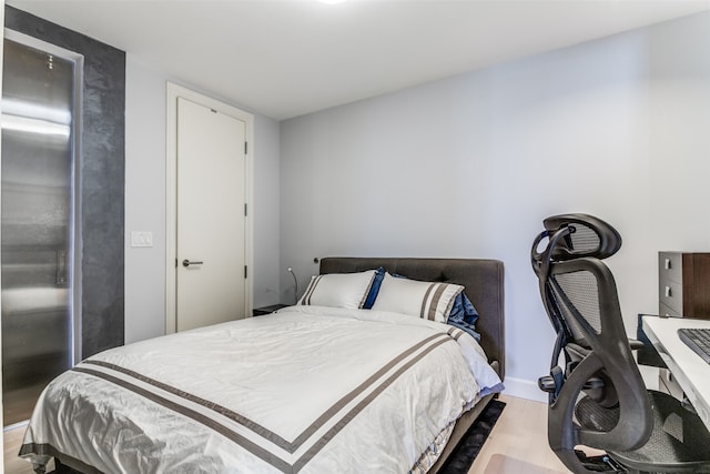 bedroom featuring light wood-type flooring