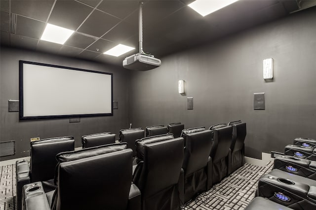 home theater room with a drop ceiling