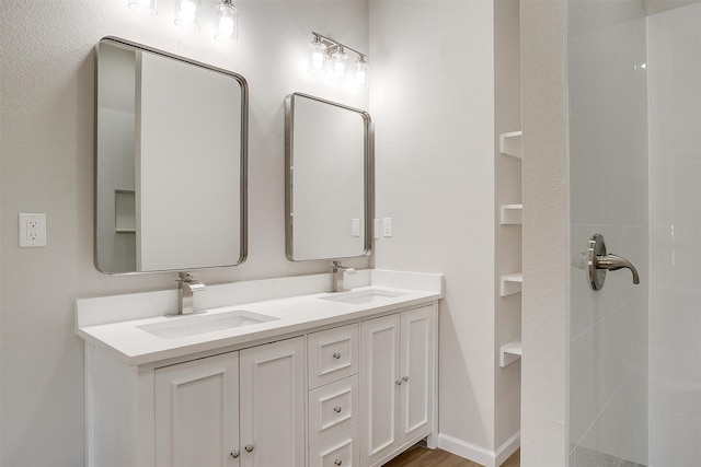 bathroom featuring vanity and hardwood / wood-style floors