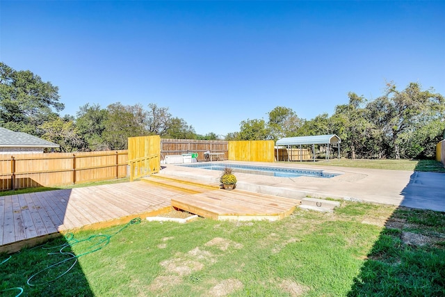 view of yard featuring a pool side deck