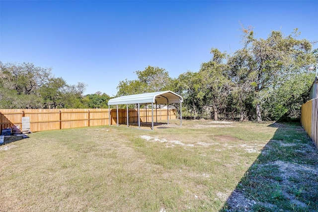 view of yard with a carport