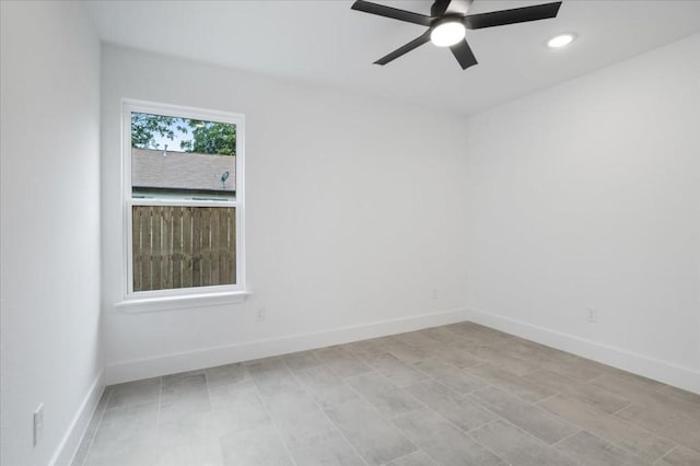 spare room featuring ceiling fan