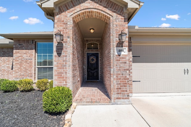 doorway to property featuring a garage