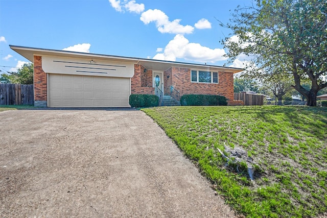 ranch-style house with a front lawn and a garage