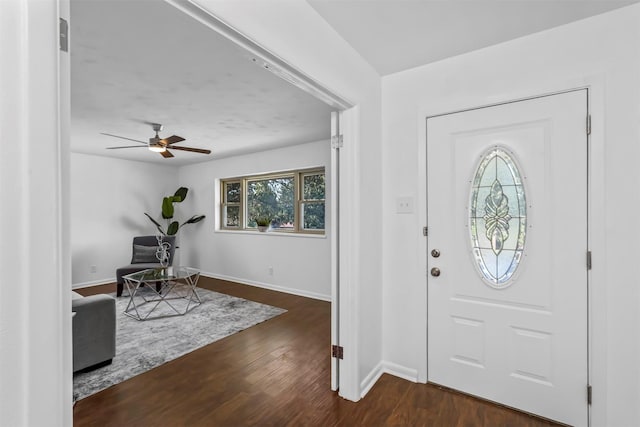 entrance foyer with ceiling fan and dark hardwood / wood-style flooring