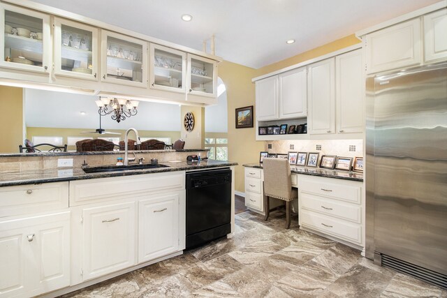 kitchen with built in desk, black dishwasher, sink, stainless steel built in fridge, and a notable chandelier