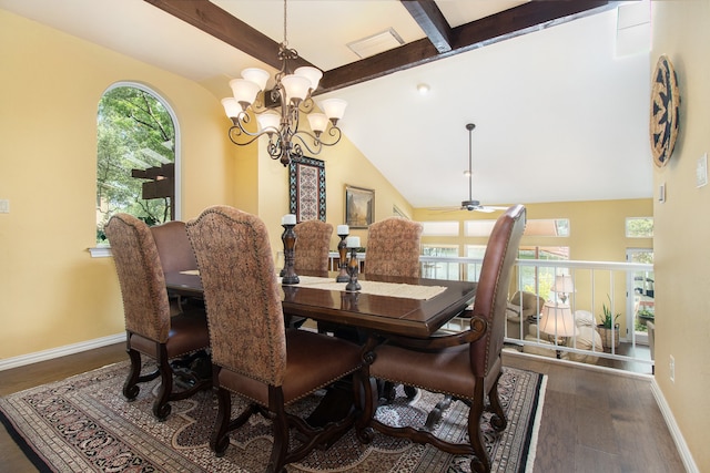 dining space with a notable chandelier, vaulted ceiling with beams, dark hardwood / wood-style floors, and a wealth of natural light