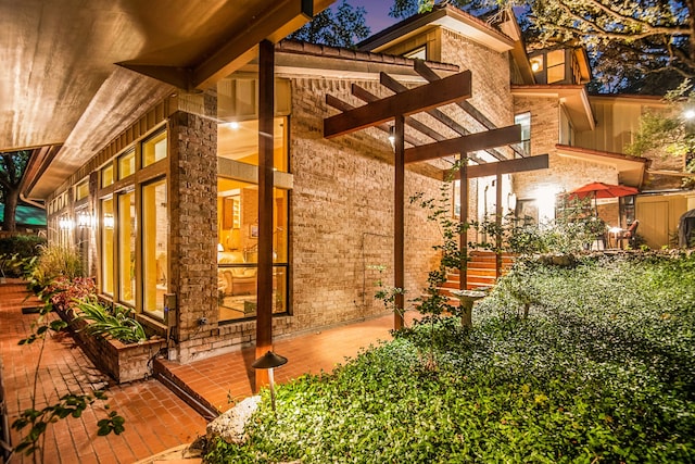 exterior space featuring a patio and a pergola