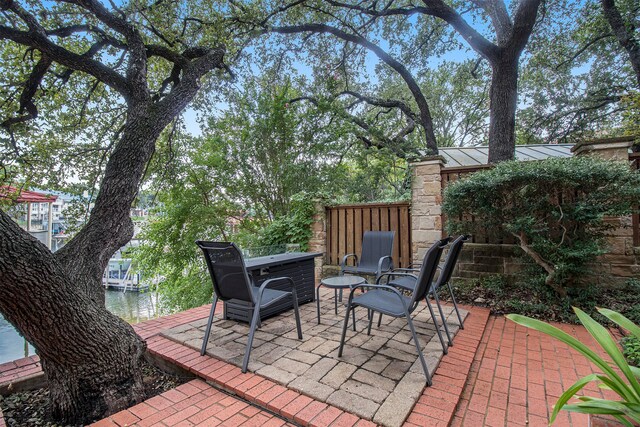 view of patio / terrace with a water view