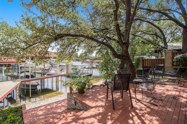 deck featuring a water view and a dock