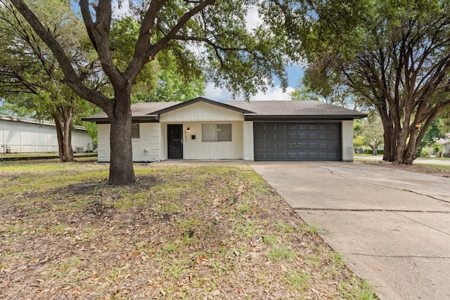 single story home featuring a garage