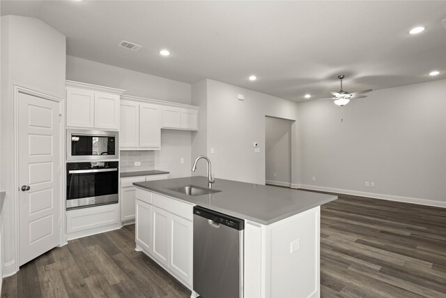 unfurnished dining area featuring dark wood finished floors, lofted ceiling, visible vents, a chandelier, and baseboards