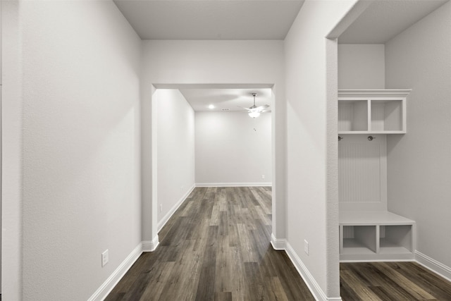 mudroom featuring dark wood-style floors, ceiling fan, and baseboards