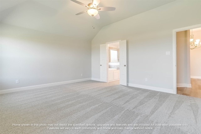 unfurnished bedroom with lofted ceiling, connected bathroom, ceiling fan with notable chandelier, and light carpet