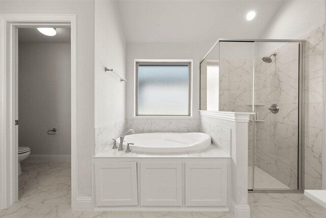 bathroom featuring baseboards, a marble finish shower, a garden tub, toilet, and marble finish floor