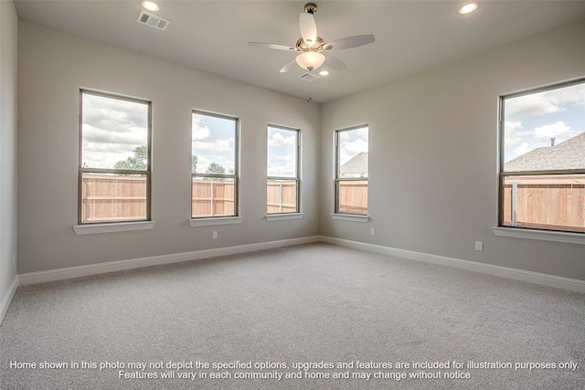 empty room featuring recessed lighting, baseboards, ceiling fan, and carpet