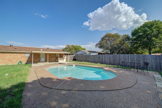 view of pool with a patio