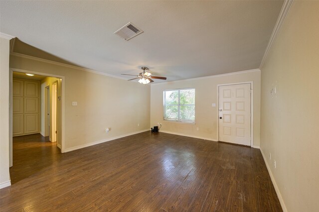 unfurnished room featuring crown molding, dark wood-type flooring, and ceiling fan