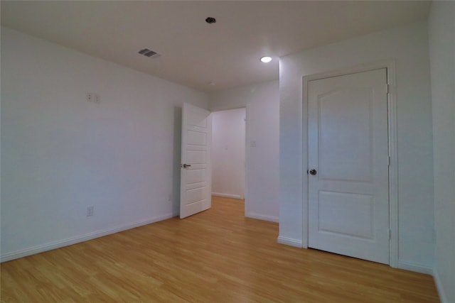 unfurnished bedroom with light hardwood / wood-style flooring