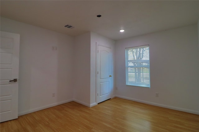 unfurnished bedroom with light hardwood / wood-style floors