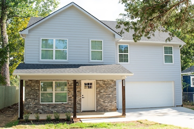 view of front of property featuring a garage