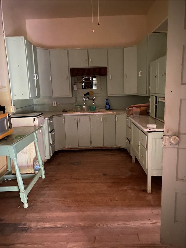 kitchen featuring dark hardwood / wood-style flooring