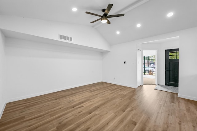 unfurnished room with vaulted ceiling, wood-type flooring, and ceiling fan