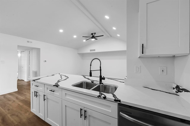 kitchen with dark hardwood / wood-style floors, stainless steel dishwasher, sink, lofted ceiling with beams, and ceiling fan