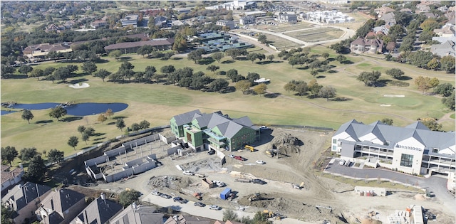 aerial view with a water view, a residential view, and golf course view