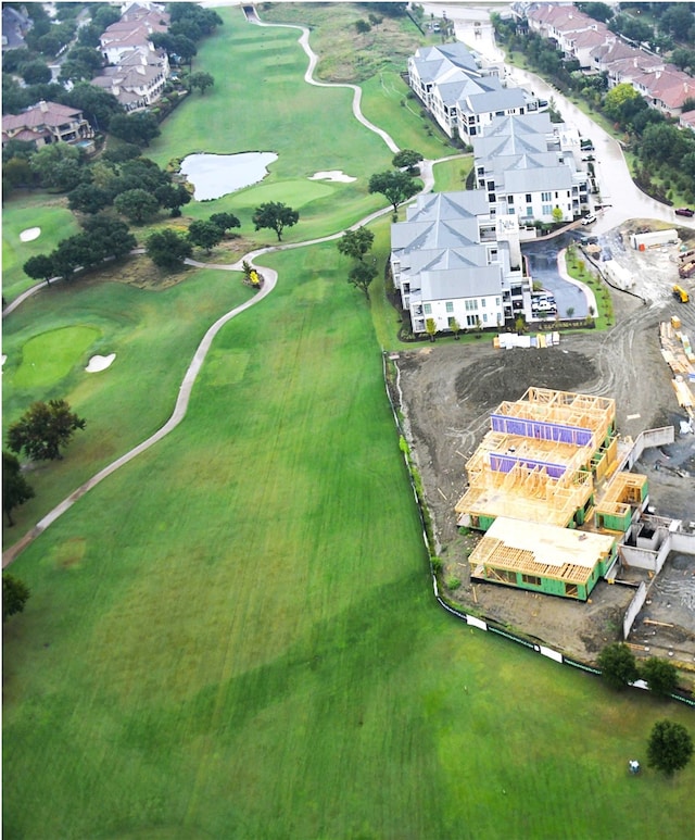 bird's eye view with view of golf course