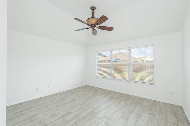 unfurnished room featuring vaulted ceiling, light hardwood / wood-style flooring, and ceiling fan