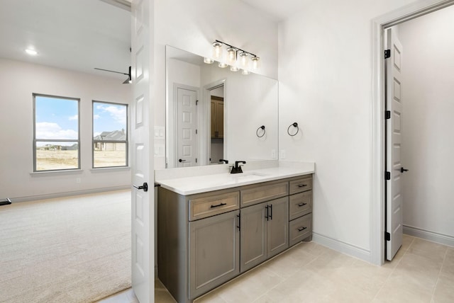 bathroom featuring tile patterned flooring and vanity