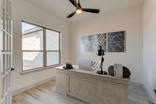 office area featuring light hardwood / wood-style floors and ceiling fan