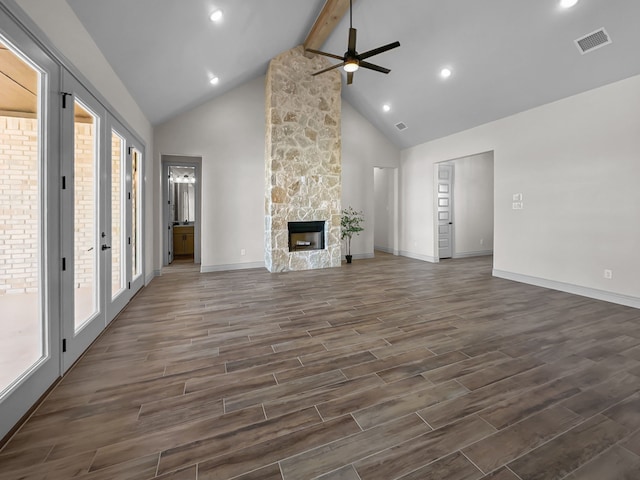 195 Coalson Xing, Azle, TX 76020 - unfurnished living room with high vaulted ceiling, a ceiling fan, beam ceiling, dark wood-style floors, and baseboards
