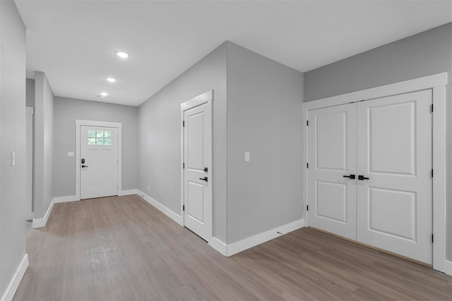 foyer with light wood-type flooring