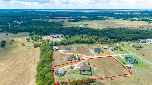 birds eye view of property featuring a rural view