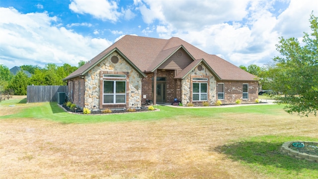 craftsman inspired home with a front yard