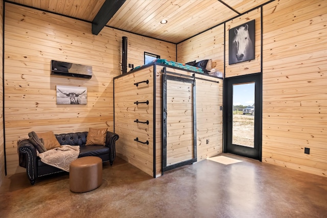 interior space featuring wooden ceiling, beamed ceiling, concrete flooring, and wooden walls