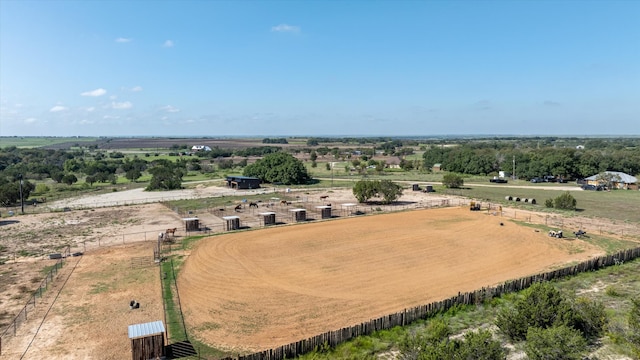 birds eye view of property featuring a rural view