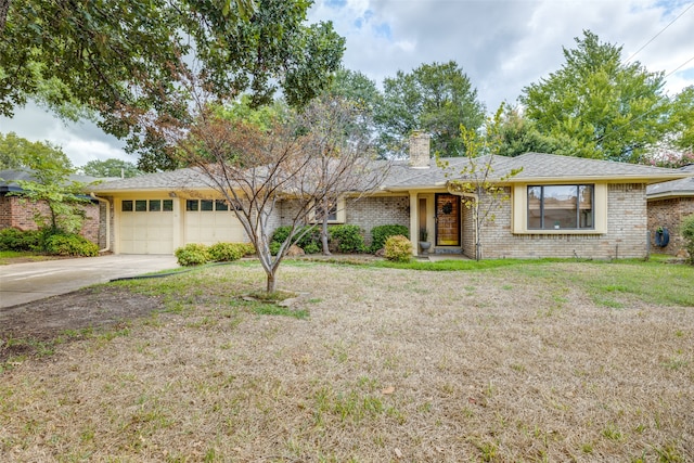 single story home with a garage and a front yard