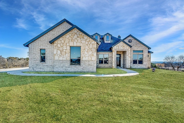 view of front of home with a front lawn