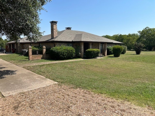 view of home's exterior featuring a lawn