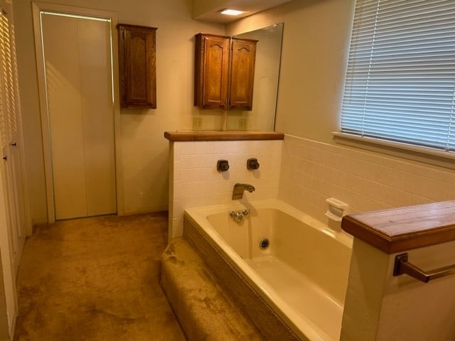 bathroom with a bath