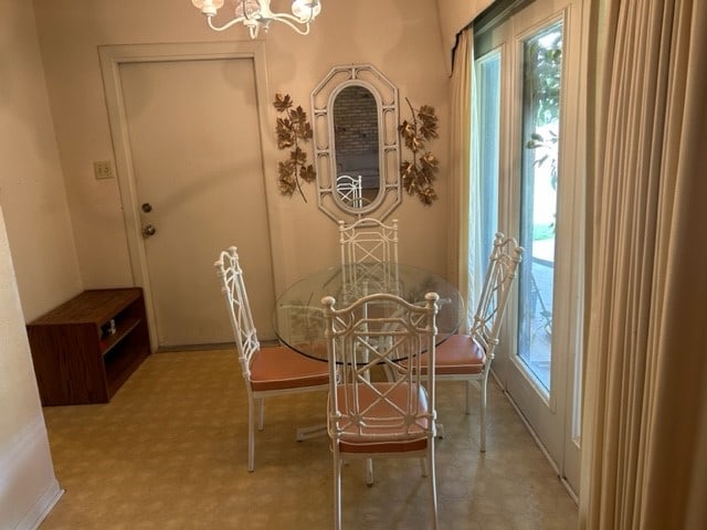 dining room with a chandelier