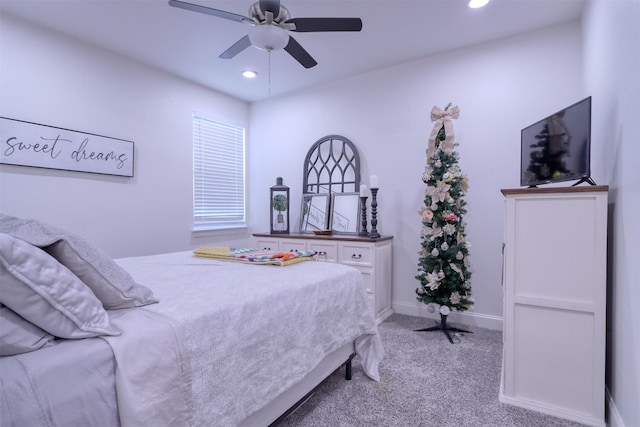 carpeted bedroom featuring ceiling fan