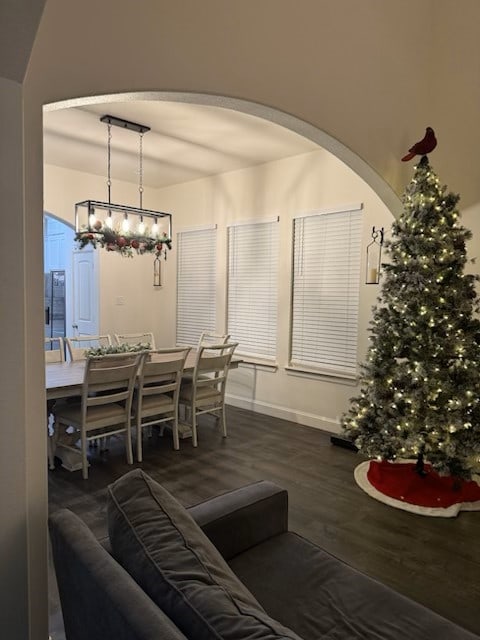 dining area featuring dark hardwood / wood-style floors