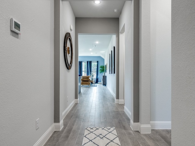 hallway featuring light hardwood / wood-style flooring