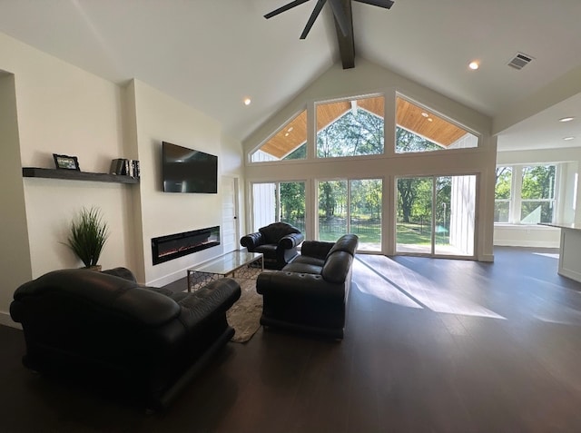 living room featuring high vaulted ceiling, plenty of natural light, hardwood / wood-style floors, and ceiling fan